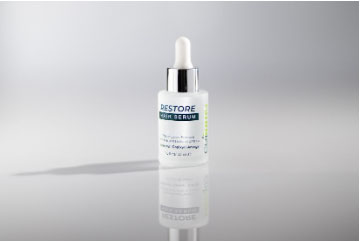 photo of celluma restore hair growth serum bottle