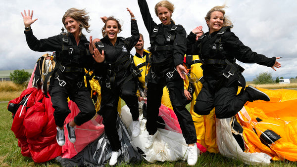 Breitling passengers happy after a parachute jump