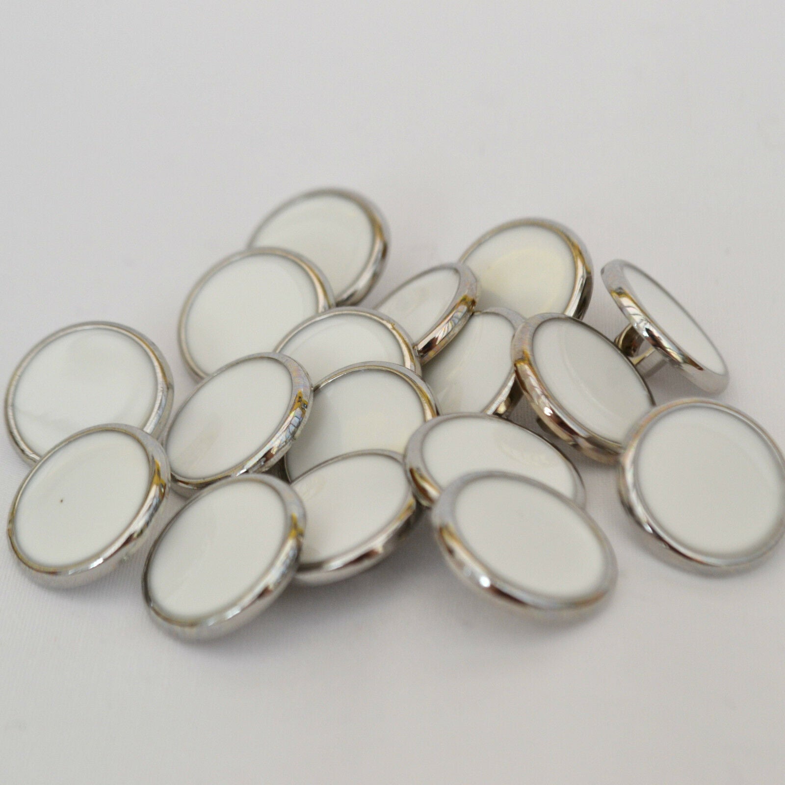 silver coloured buttons