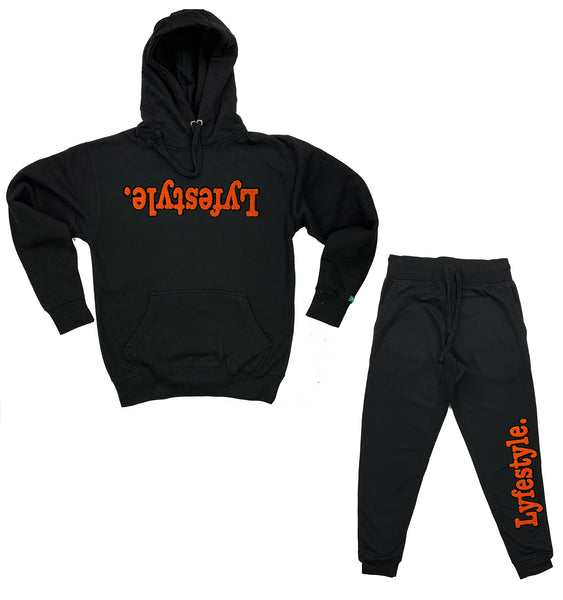 black and orange sweatsuit