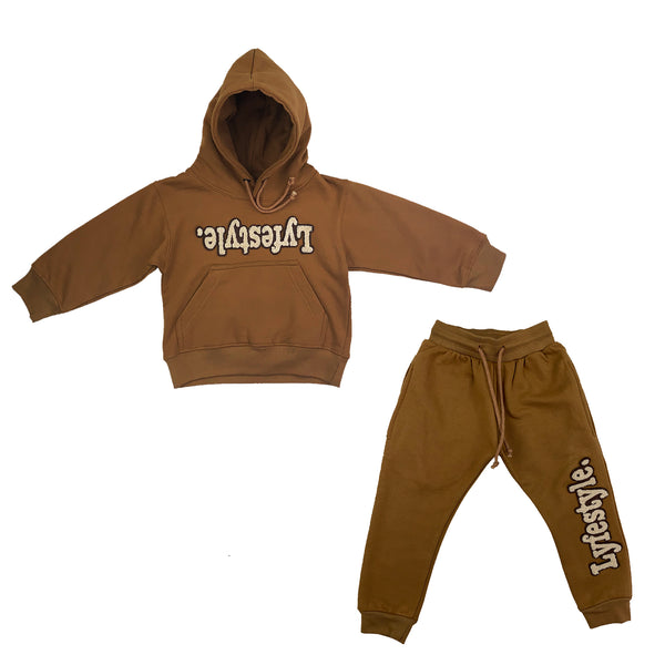 brown sweat suit