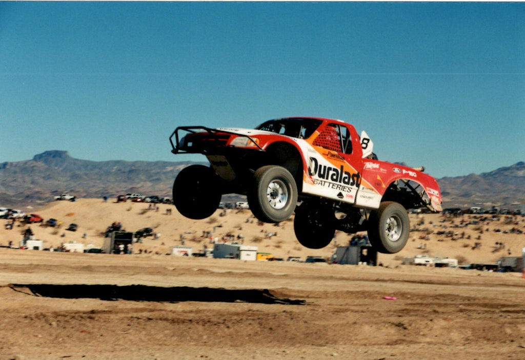 Dave Ashley Duralast Trophy Truck jumping in and off road race