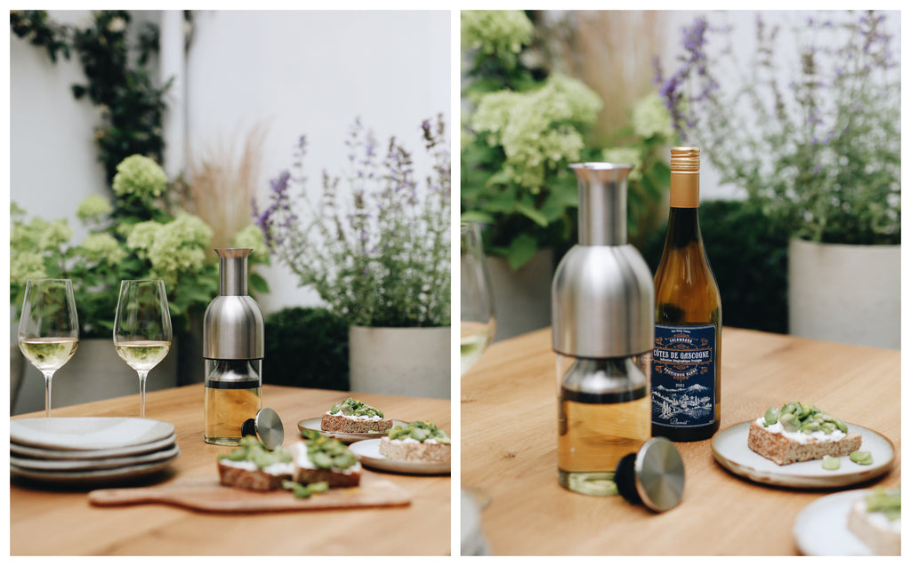 Broad bean, mint and ricotta bruschetta paired with a Côtes de Gascogne Sauvignon Blanc decanted into a stainless steel satin eto wine decanter.