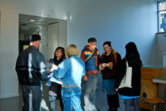 Translators Don Mee Choi and Alejandro de Acosta talk to Melanie Noel and other festival goers