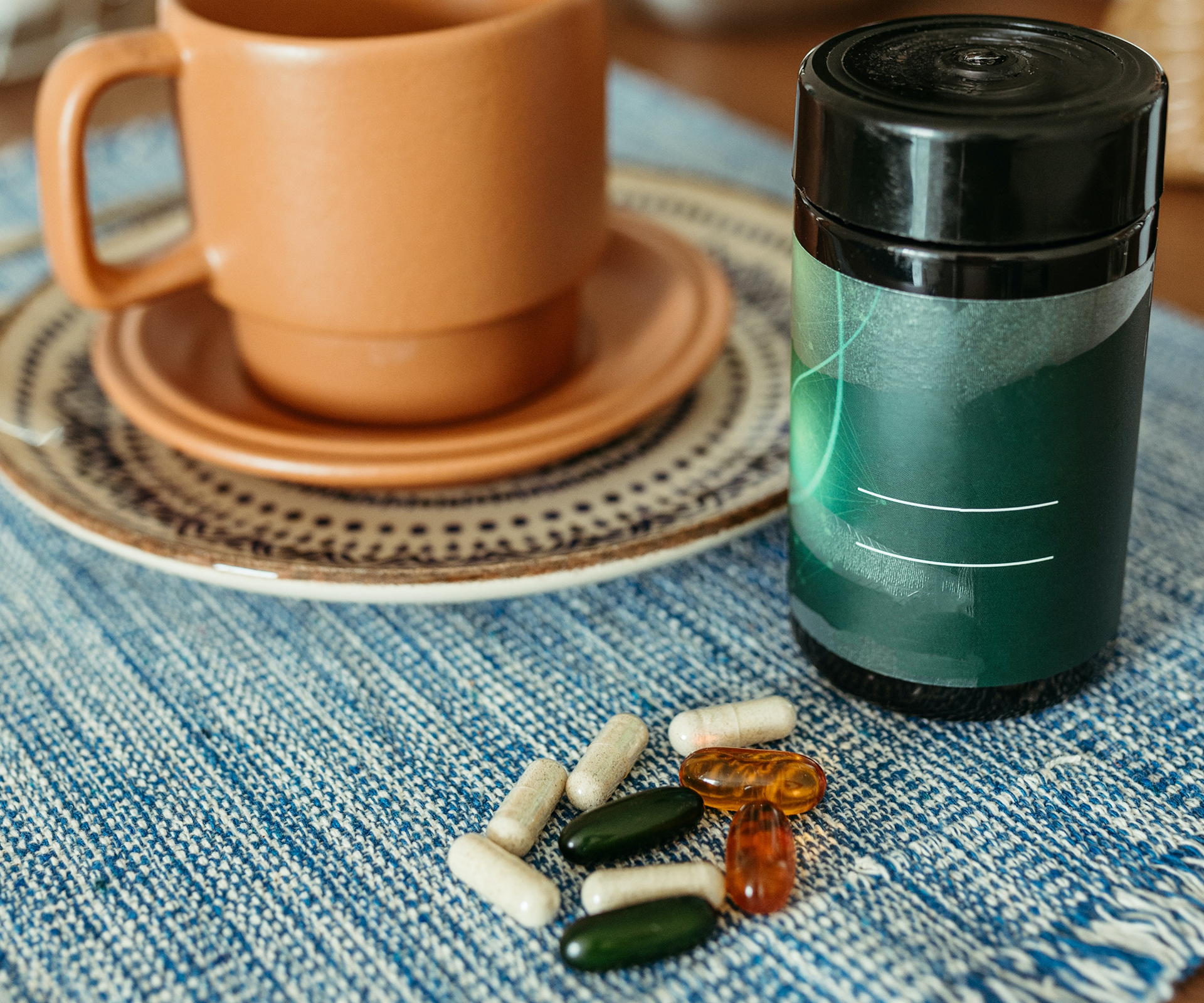 Vitamins and supplements with a coffee mug