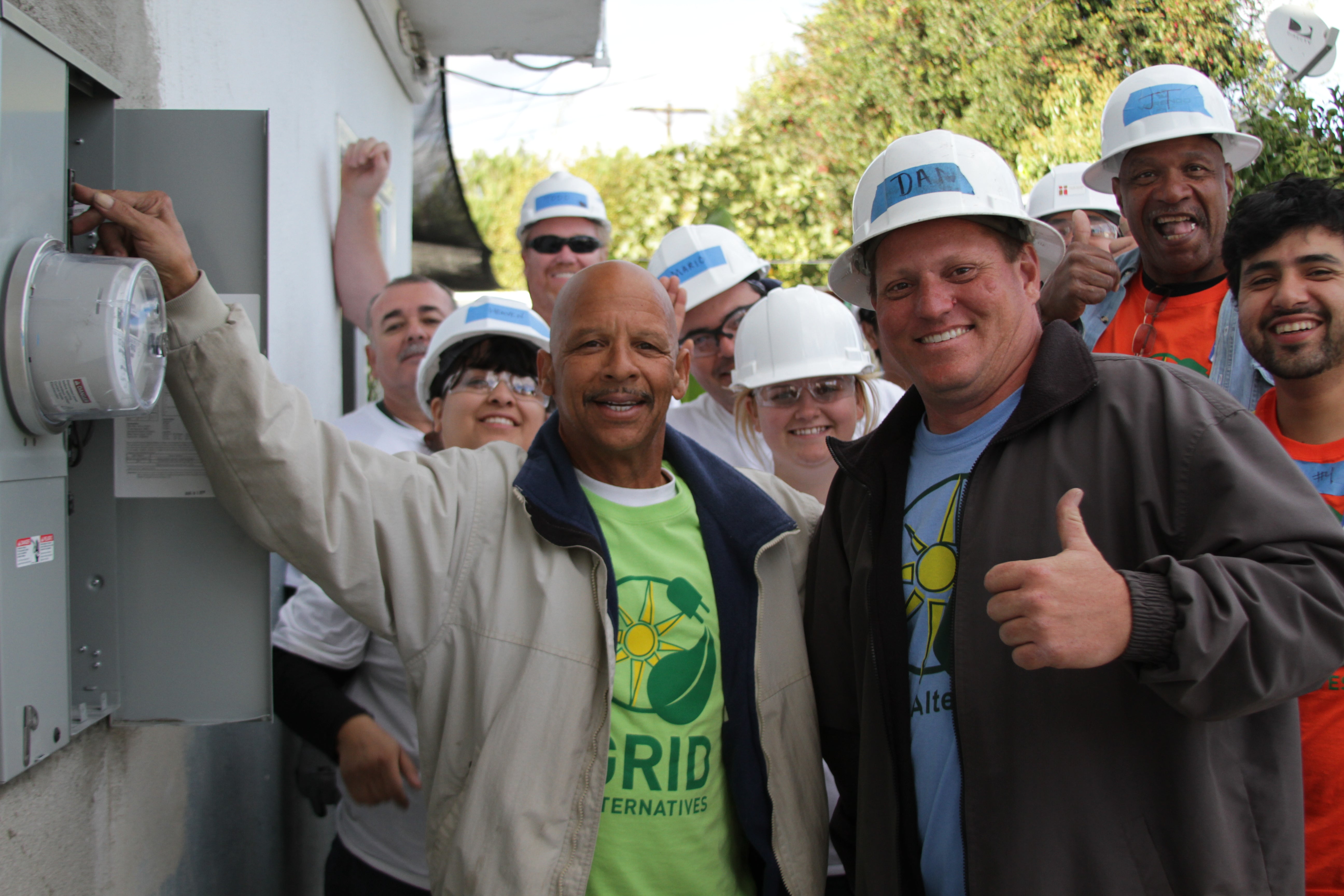 Group of GRID Alternatives volunteers helping build more renewable energy into underserved communities