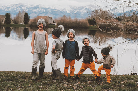 five kids wearing wool base layers