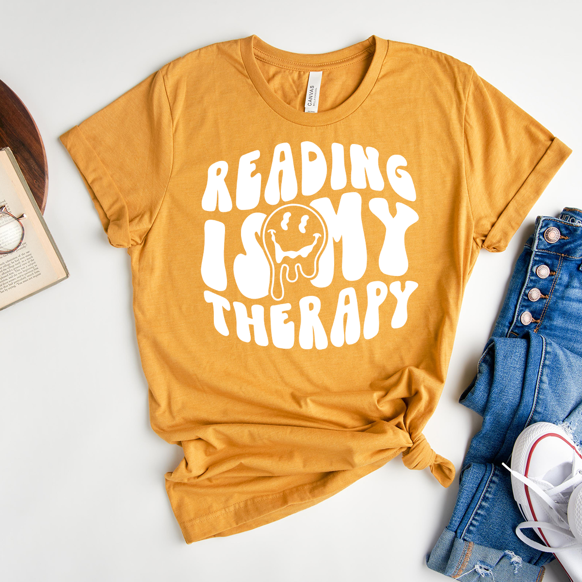 reading is my therapy unisex tee