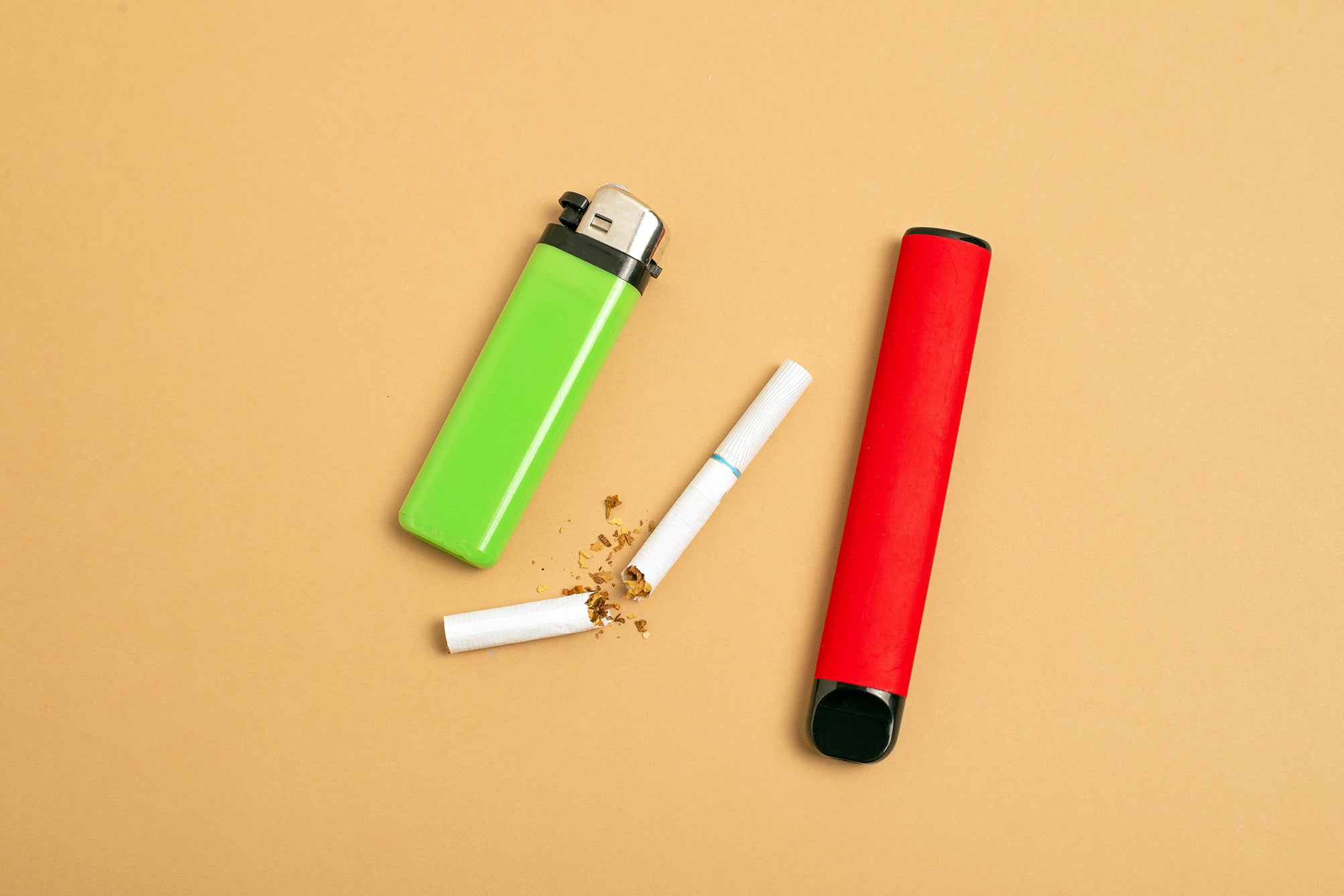 cigarette and disposable vape and lighter