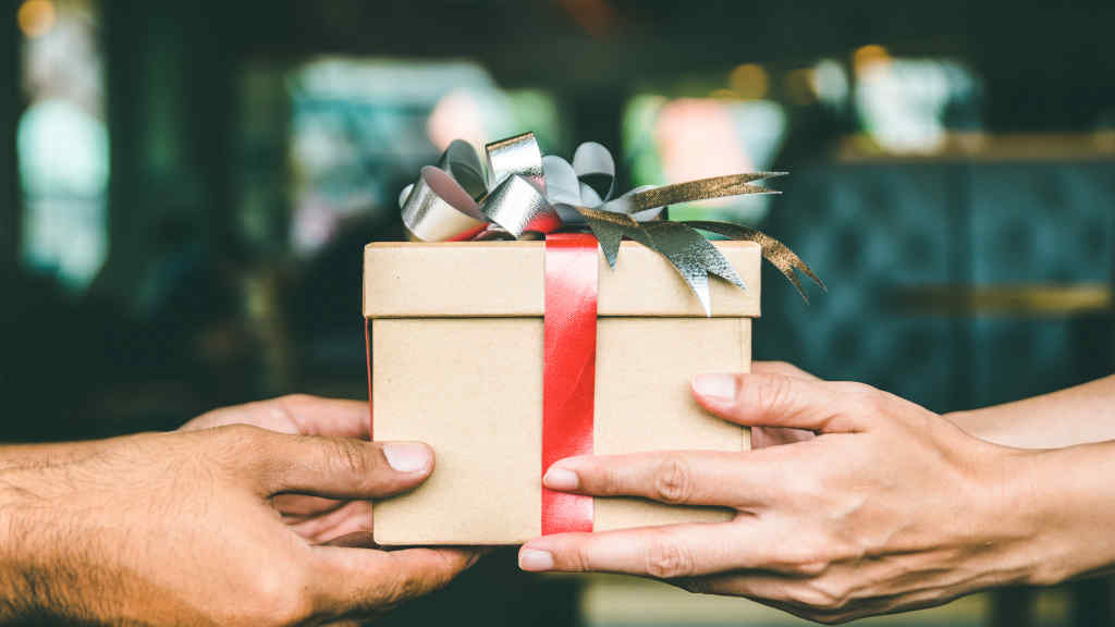 "Naughty or Nice?": Celebrating Santa's List Day - Gift Giving