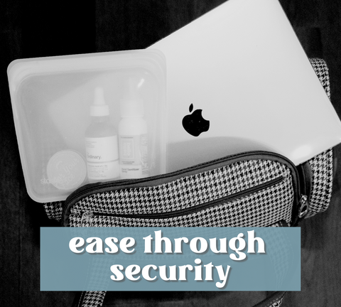 Liquid sanitizer and face serum in reusable silicone bag and laptop sticking out of carry on luggage with the words "ease through security" witten on top.