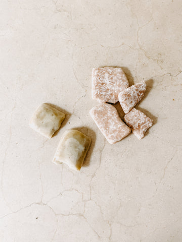 Crumbly small pieces of shampoo bar and soap bar. 