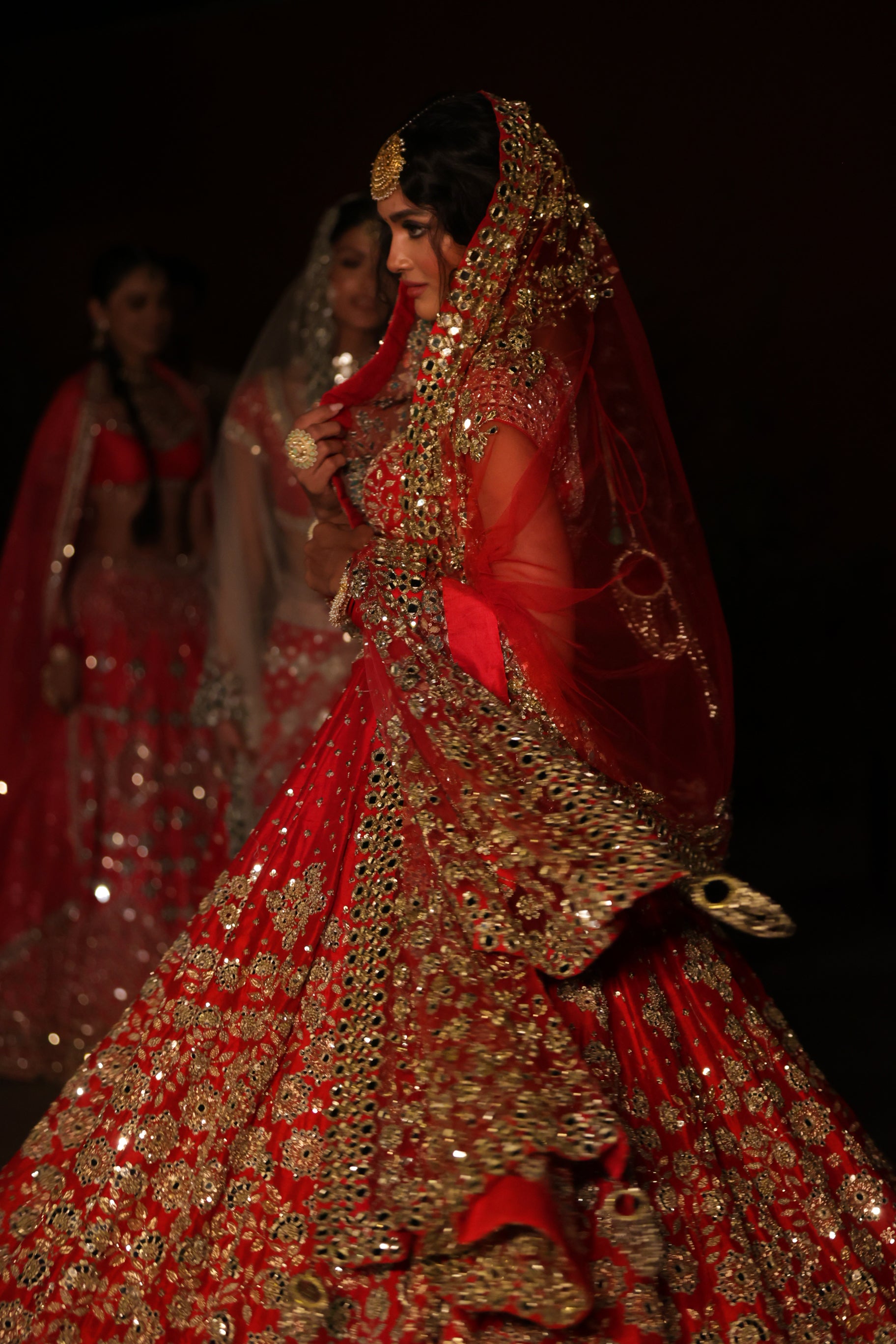 Genelia's summer-friendly wedding look in an ivory mirror work lehenga!