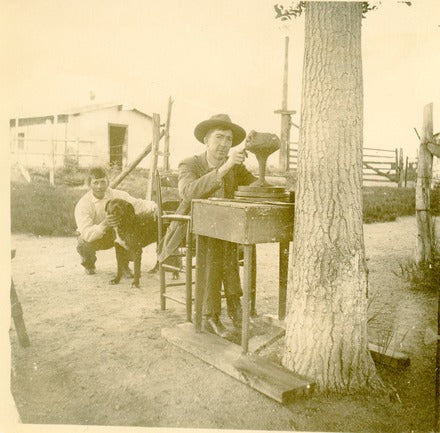 Here’s a photo of Artus at the Holmes house working on a cup.