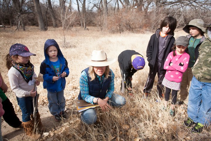 A school group learning about some of the native plant species of the ranch. Photo by Sean Cayton.