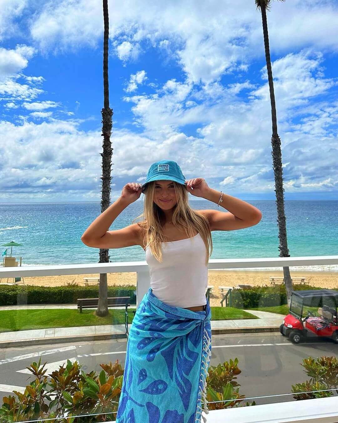 the pretty Katherine Vonderahe wearing Shaka Love sustainable hat for sun protection and enjoying summer