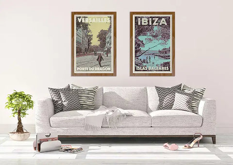 Retro Versailles and Ibiza travel poster above a sofa, interesting composition with a duotone of yellow and blue hues in a white interior