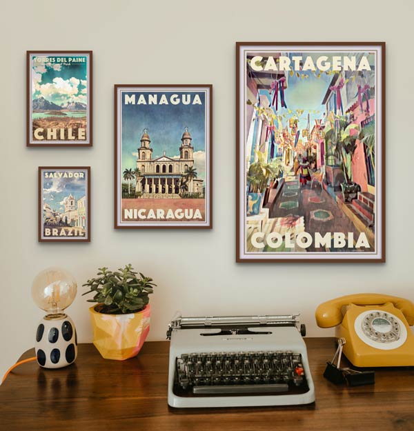 An accent wall with Travel Posters from South America