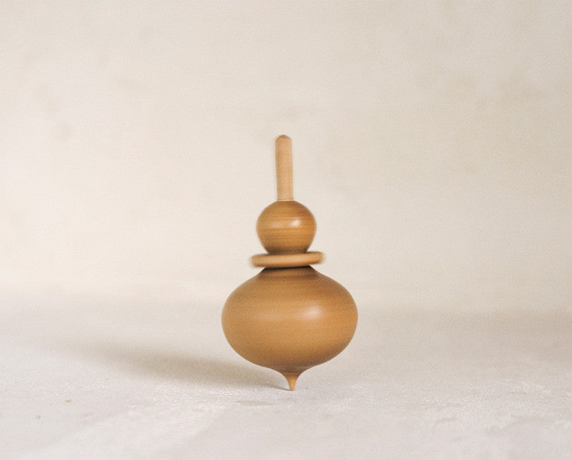 wooden spinning tops