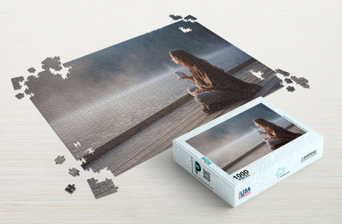 Woman relaxing 1000-piece puzzle