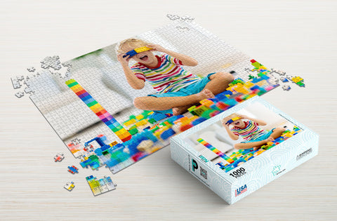 Kid playing lego 1000-piece puzzle package