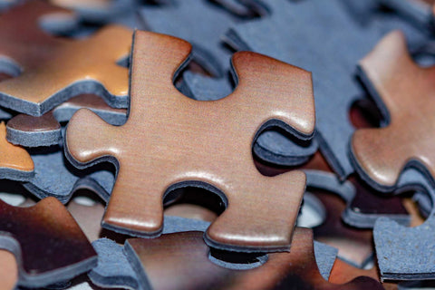Custom Puzzle Manufacturing - puzzle piece die cutting | MakeYourPuzzles