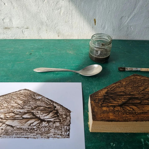 the resulting print with the matrix and tools next to it