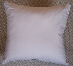 Reverse of art cushion coloured grey.