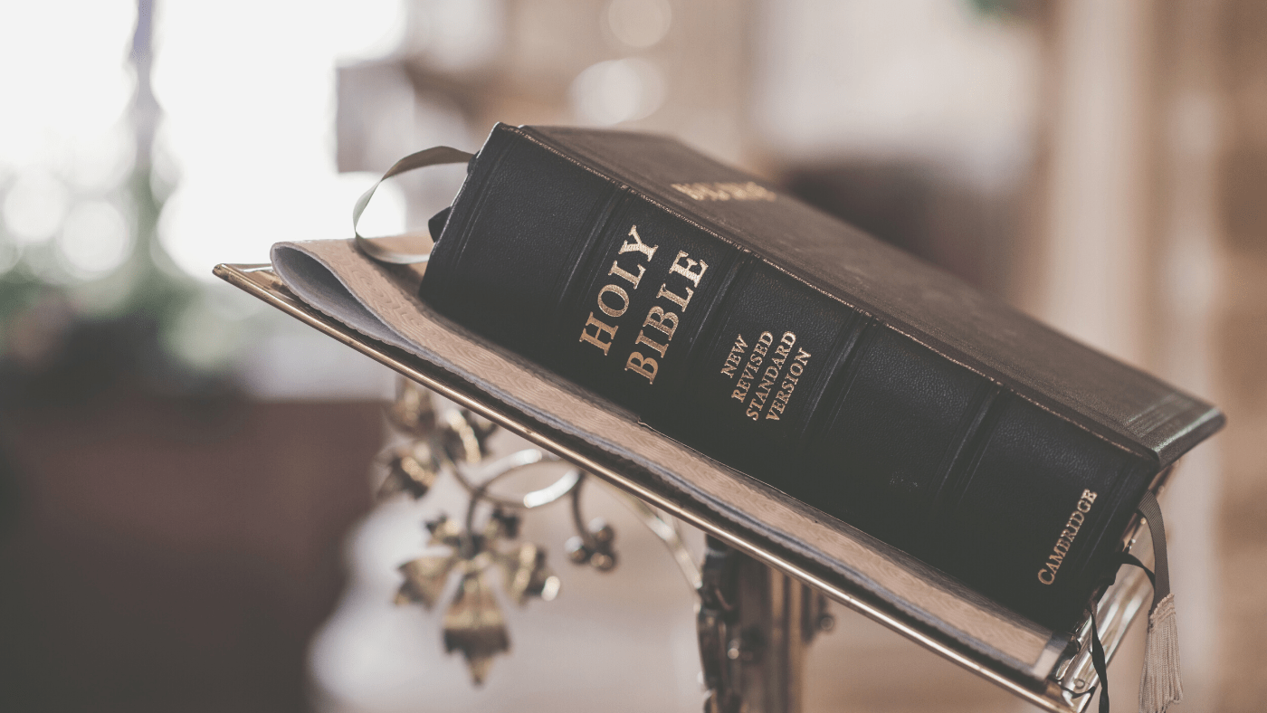 holy bible on pedestal in church 