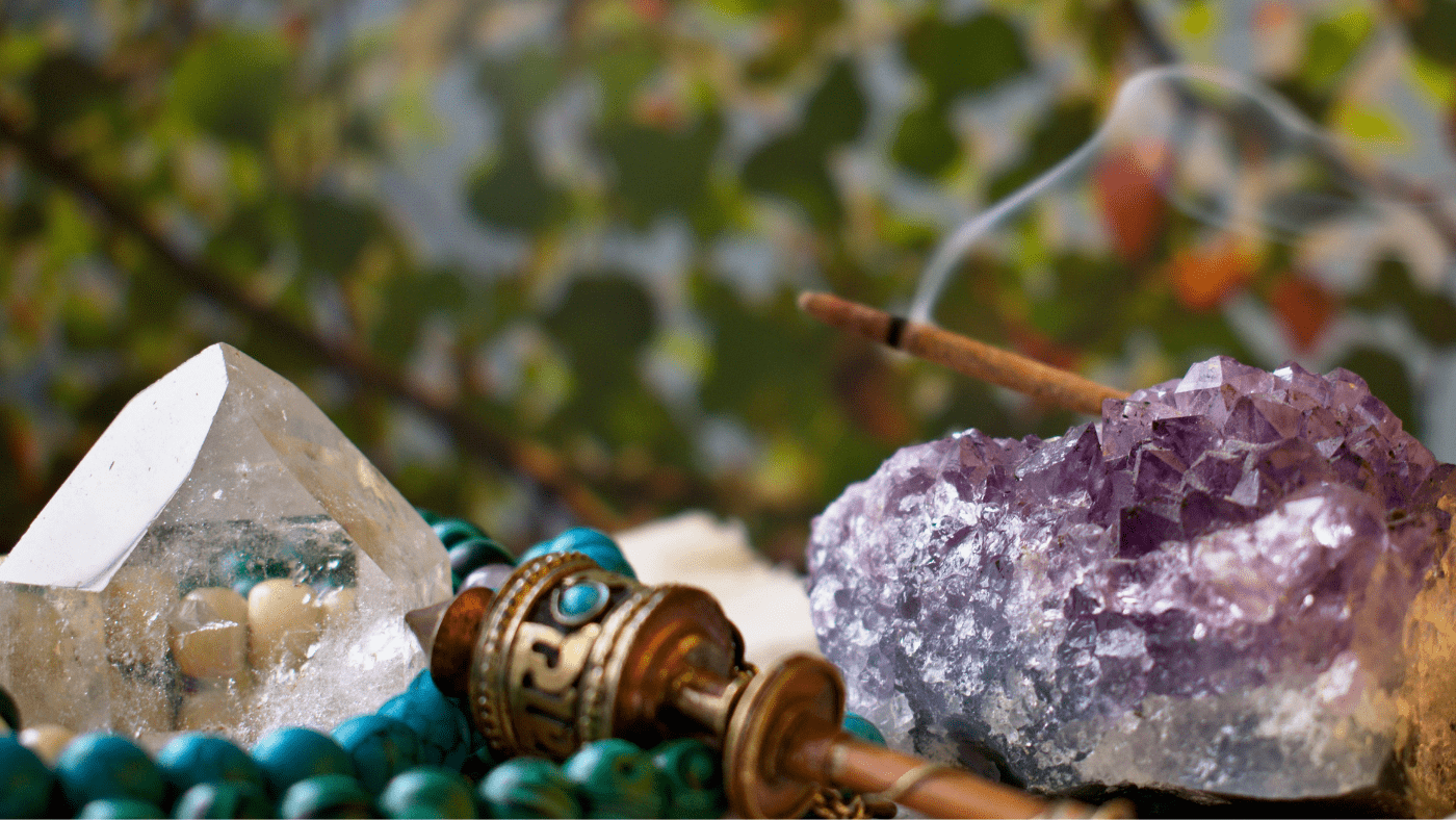 crystals surrounded by incense smoke