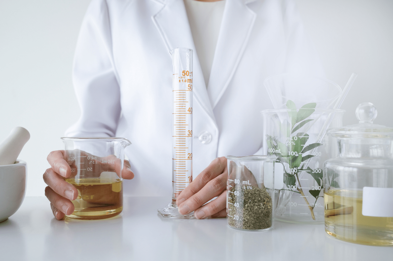woman testing out ingredients in a lab