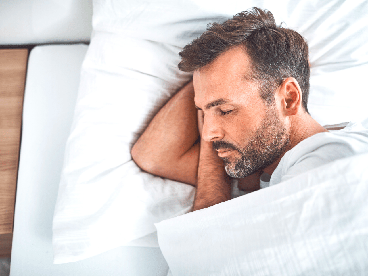 man sleeping peacefully as a self love action