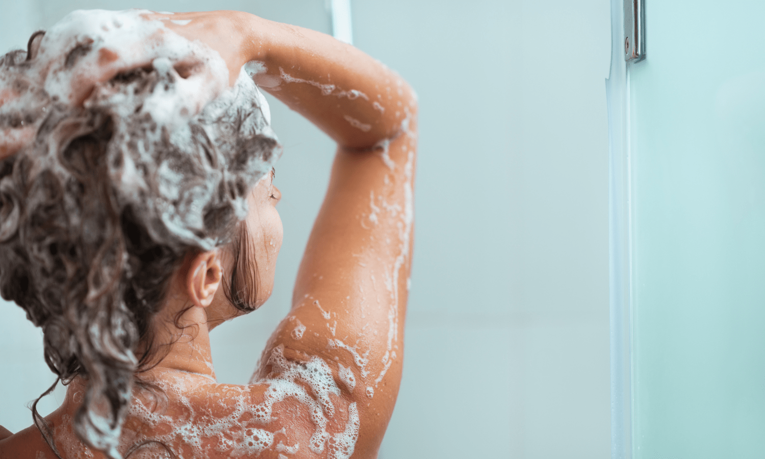 person showering using nefertem products