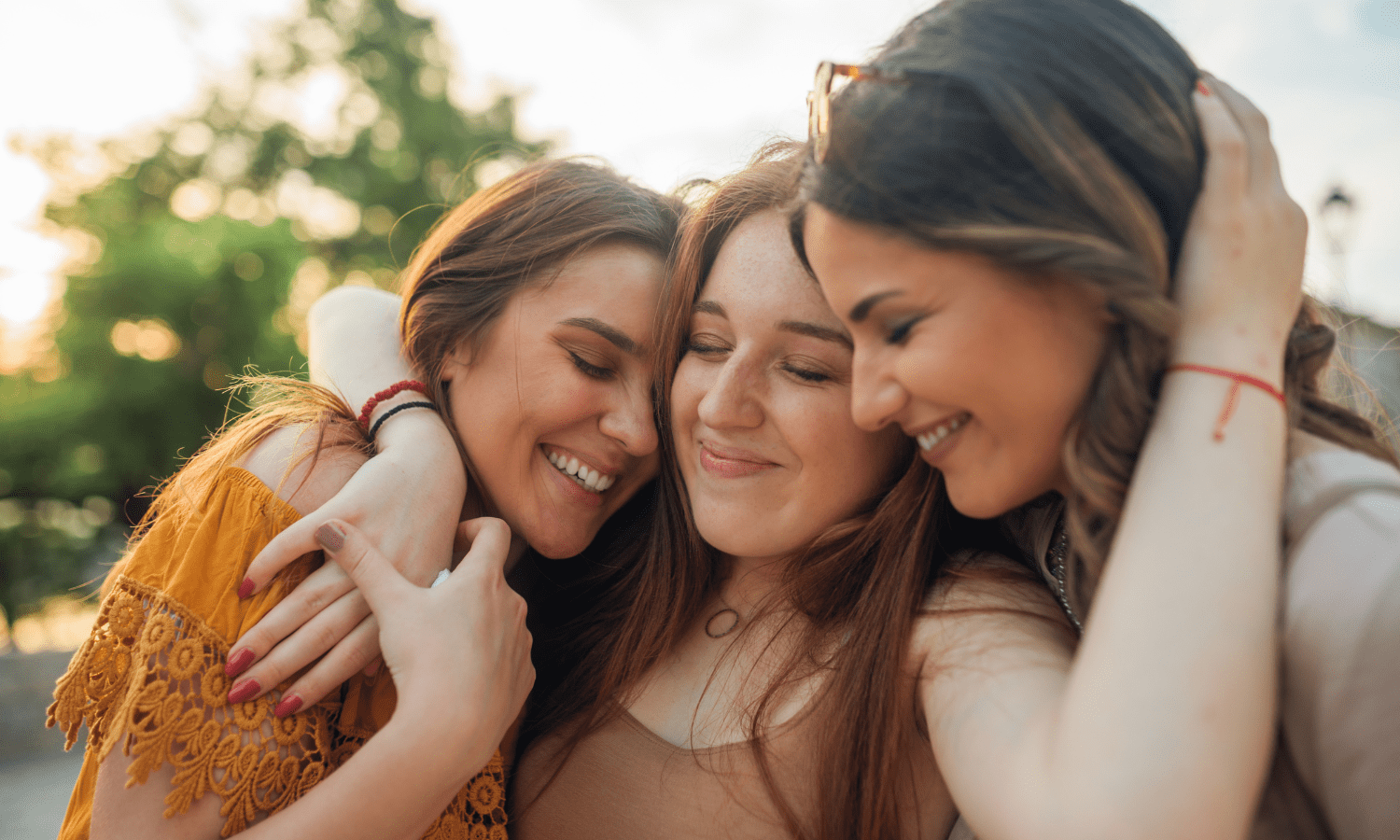 a group of friends hugging 