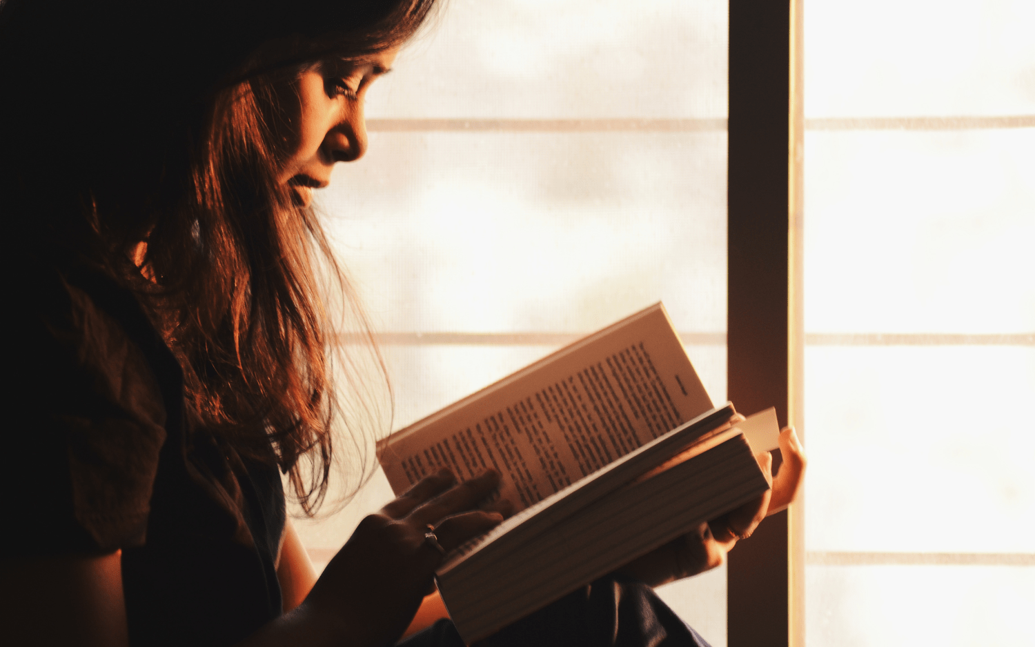 women reading a book