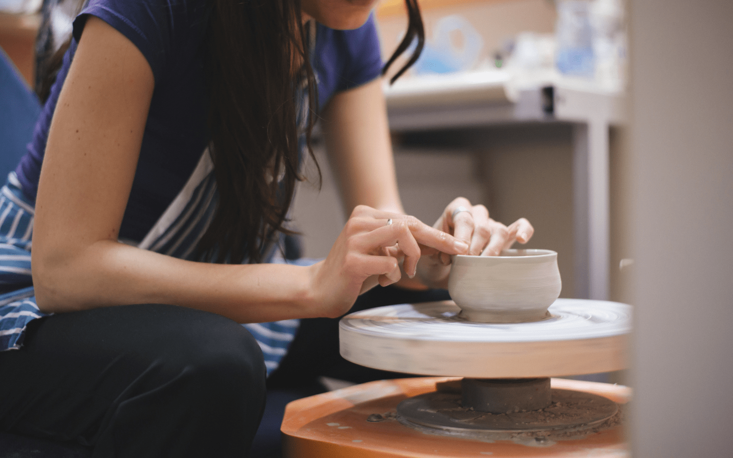 women making pottery 