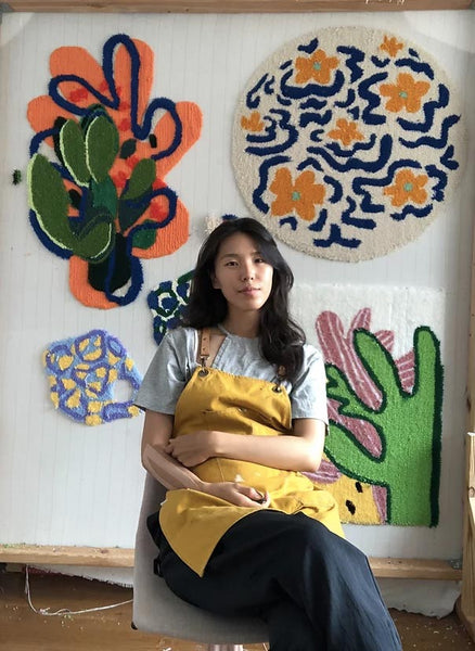 Youkyung Kaycee Woo in her studio