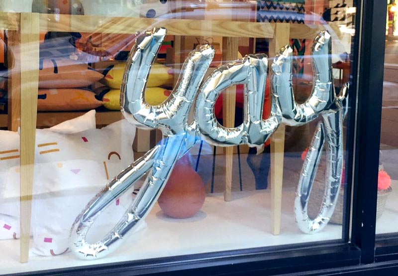 silver balloons in the letters "y" "a" "y" -- yay!