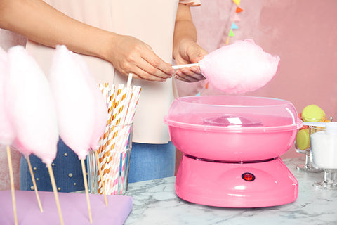 Making cotton candy is fun and delicious!