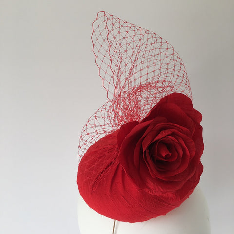 red dupion silk button hat, with red veiling.