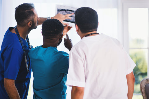 Doctors looking at a patients report