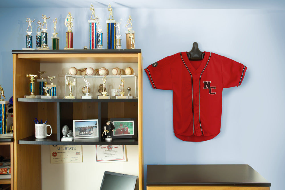 JerseyGenius® used to hang a jersey to decorate a dorm room