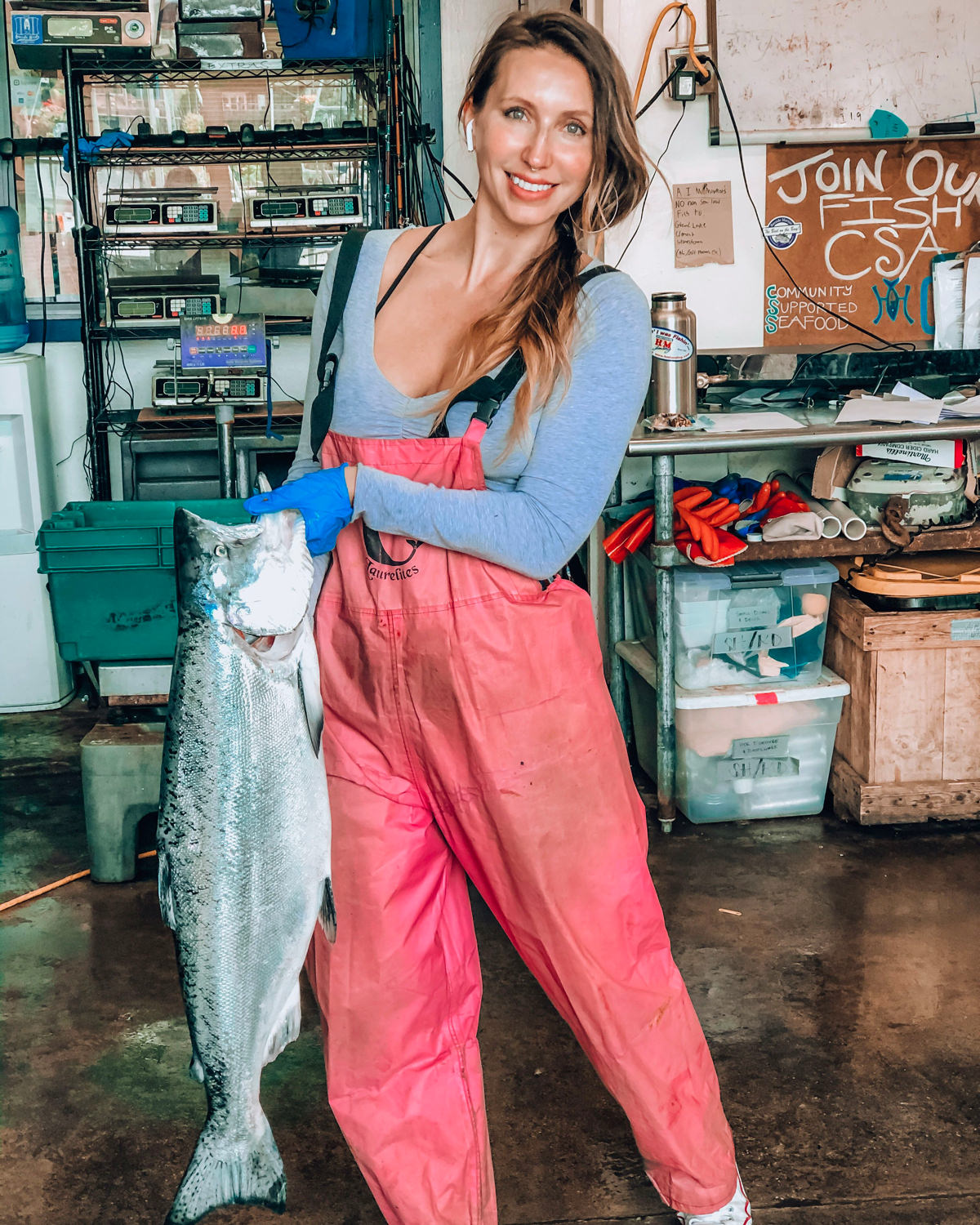 Woman holding tuna