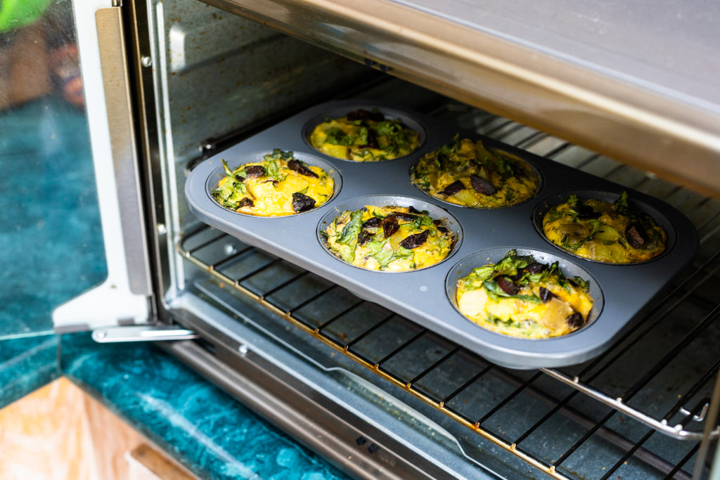 Breakfast Cups being taken out of oven