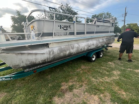 Scrub ALuma Brite onto pontoon boat