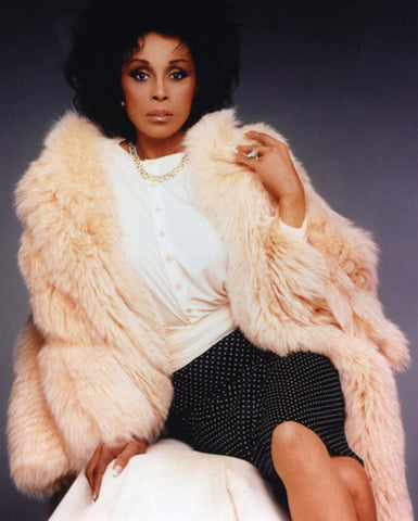 Dynasty's jewellery, power dressing, iconic TV show, 1980s, lasting influence, fashion, pop culture, extravagant fashion, accessories, dramatic jewellery, Alexis, Krystle, cultural phenomenon, wealthy Carrington family, oversized earrings, statement necklaces, dramatic brooches, Joan Collins, style icon, confident, daring, bold, extravagant, oversized hoop earrings, Cleopatra necklace, Linda Evans, Krystle Carrington, timeless beauty, elegance, impeccable sense of style, high-class status, delicate necklaces, statement-making bracelets, classic jewellery pieces, chunky gold bracelets, colourful earrings, playful touch, Diahann Carroll, Dominique Deveraux, high-profile businesswoman, diamond chokers, oversized diamond drop earrings, thick gold cuffs, strength, confidence, sophisticated, jewellery designers, hit 1980s TV series, Kenneth Jay Lane, luxurious, opulent, Jean Schlumberger, intricate designs, mix of diamonds, gold, other precious stones, Angela Cummings, David Webb, understated designs, bold, innovative pieces, edginess, Les Bernard, beloved characters, Alexis Colby, unforgettable jewellery, shaping fashion trends, cultural phenomenon, huge impact, memorable, iconic.