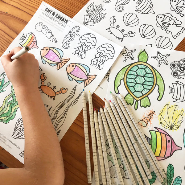 Child colouring in underwater creatures printout