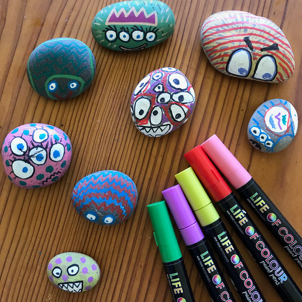 painted pebbles and acrylic paint pens