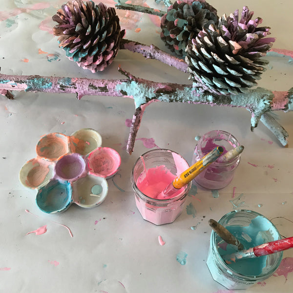 messy painted pine cones and branches kids art