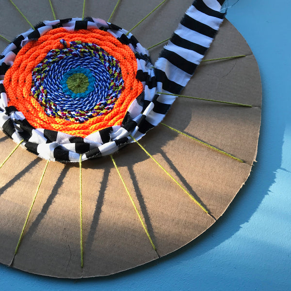 Easy Cardboard Circle Weaving for Kids - Happy Hooligans